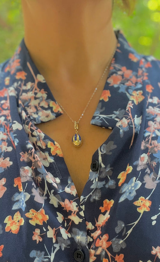 Enamelled Navy blue Lucky beginning egg charm with scattered diamonds