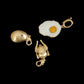 Sunny Side up charm in yellow gold and enamel